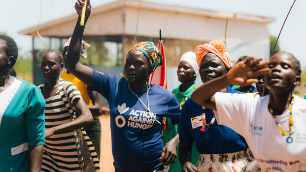 Frauen aus dem Südsudan, darunter Mitarbeiterinnen von Aktion gegen den Hunger und anderen Organisationen bei einer gemeinsamen Aktion
