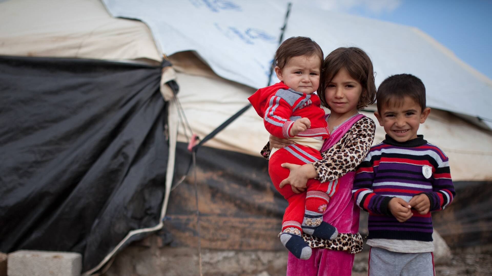 © Aktion gegen den Hunger/Florian Seriex Aus Syrien geflüchtete Kinder im Garmawa Camp in 2014