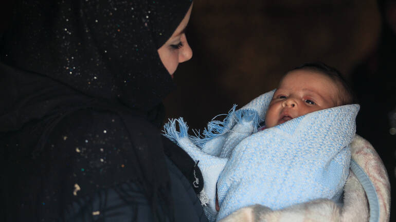 Syrische Mutter und ihr Baby