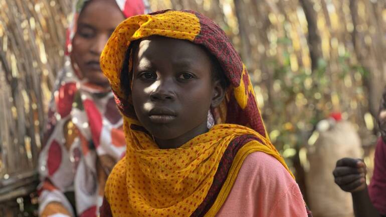 Eines der Kinder der geflüchteten Familien